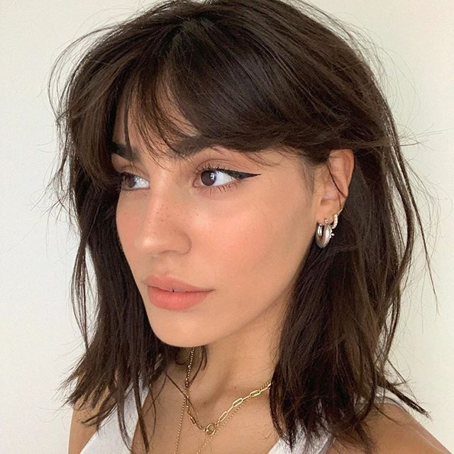 wolf cut with curtain bangs